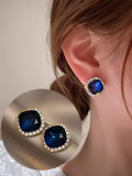 Korean trendy with blue stone earring